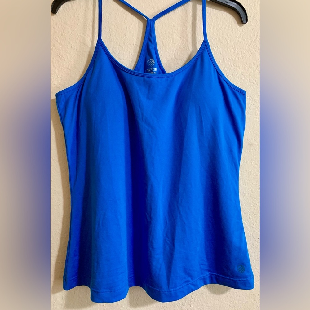 NWOY Size XL blue MPG workout tank. Never been worn.